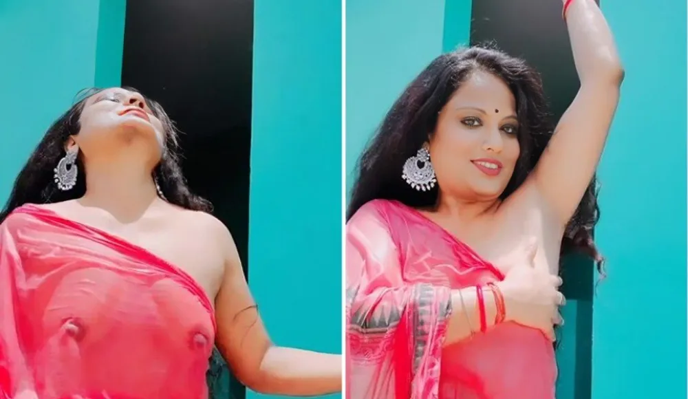 Hot Bhabi Showing Boobs Through Wet Saree